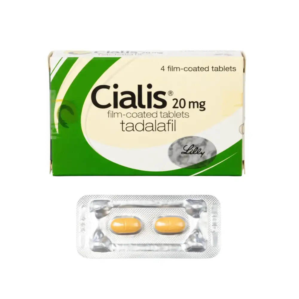 Direct frontal flat lay of green and white Cialis 20mg
